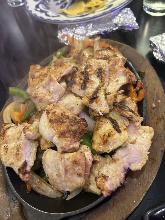 47. Steak, Chicken or Carnitas Fajitas